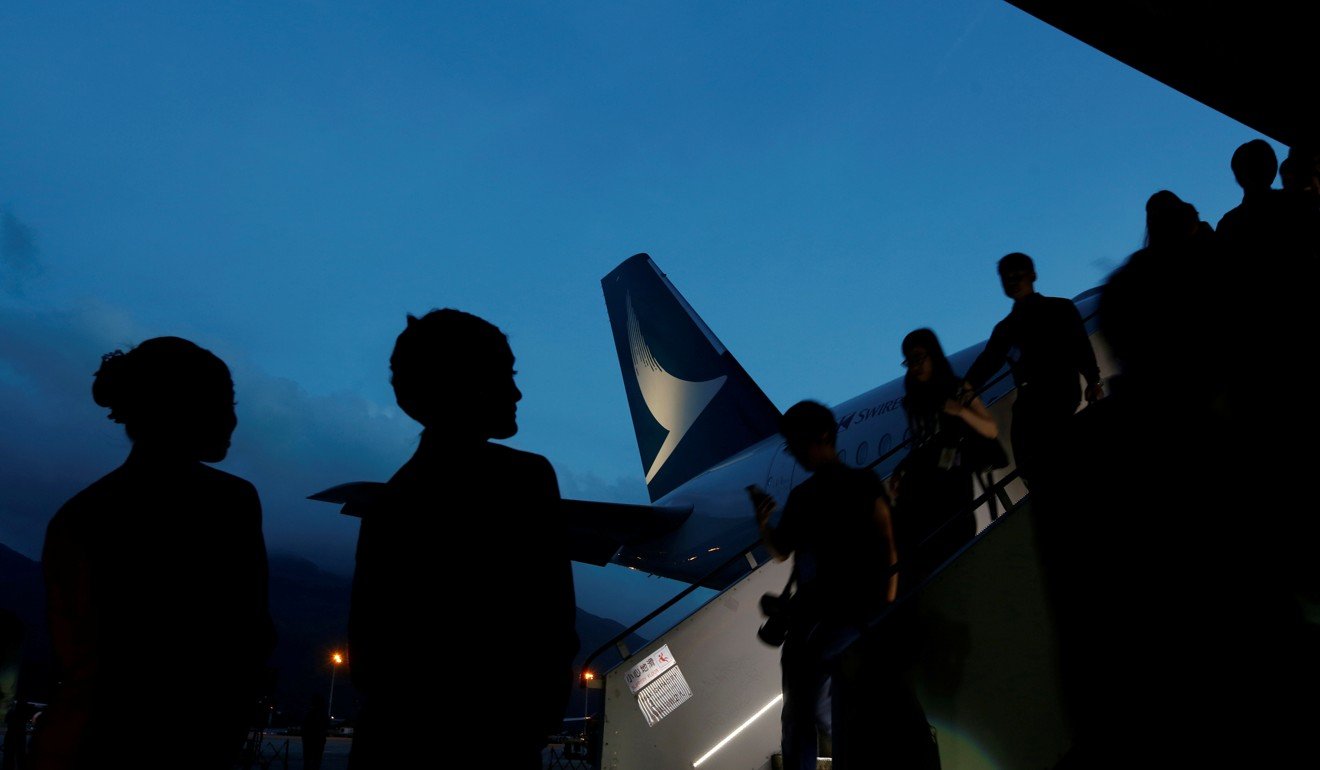 The flight attendants unions of Cathay Pacific and Cathay Dragon have urged their members to back the company and refrain from making political statements. Photo: Reuters