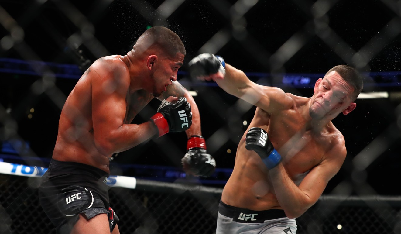 Nate Diaz throws a punch at Anthony Pettis in the second round. Photo: AFP