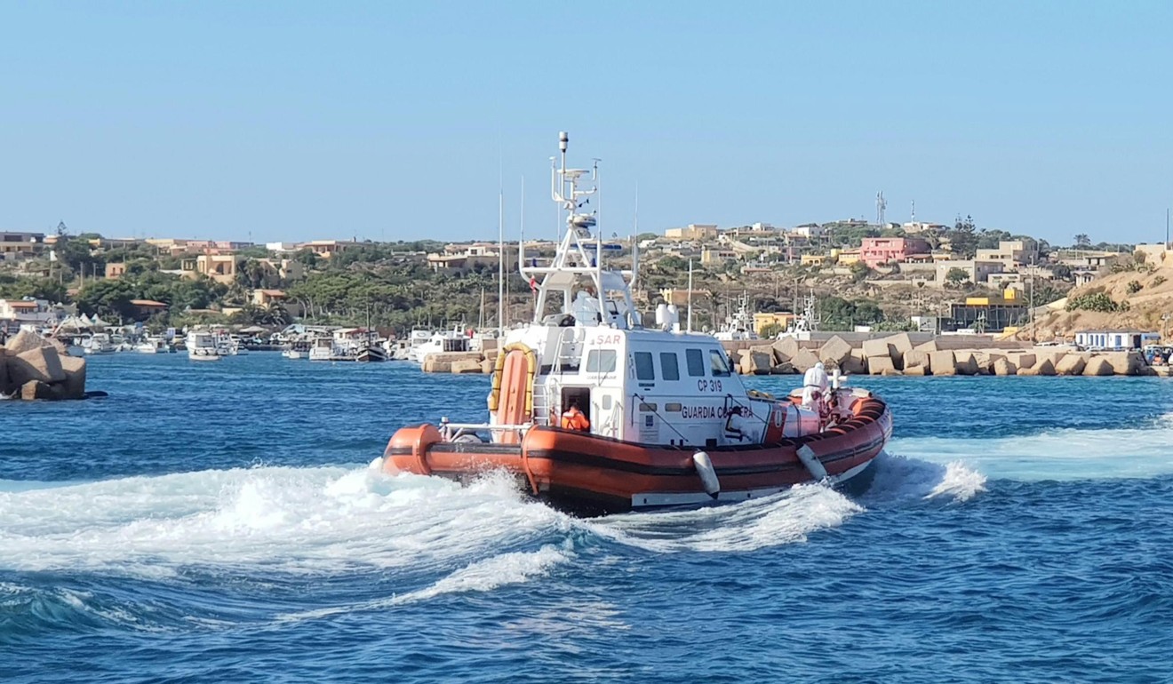 Boats carrying 27 unaccompanied minors arrive at the port of Lampedusa, Sicily. Photo: EPA-EFE