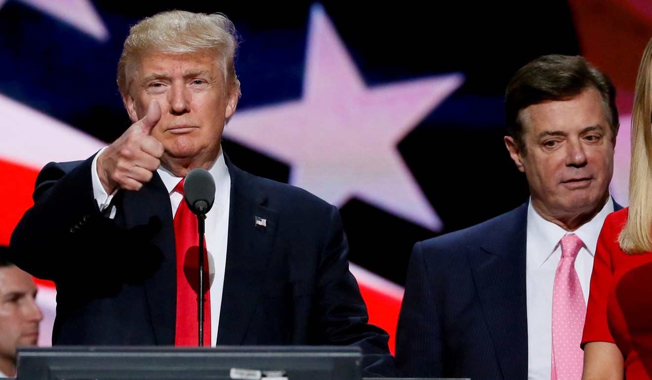 Donald Trump gives a thumbs up as his then campaign manager Paul Manafort looks on at the Republican National Convention in 2016. File photo: Reuters