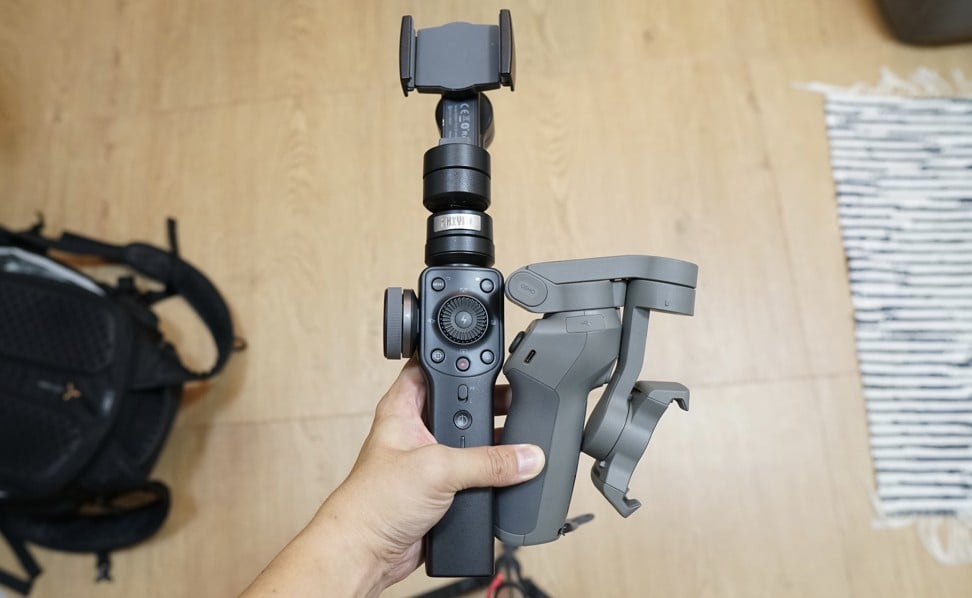 When the Osmo Mobile 3 is folded in half (right), it becomes much more compact than rival smartphone gimbals such as the popular Zhiyun Smooth 4 (left). Photo: Ben Sin
