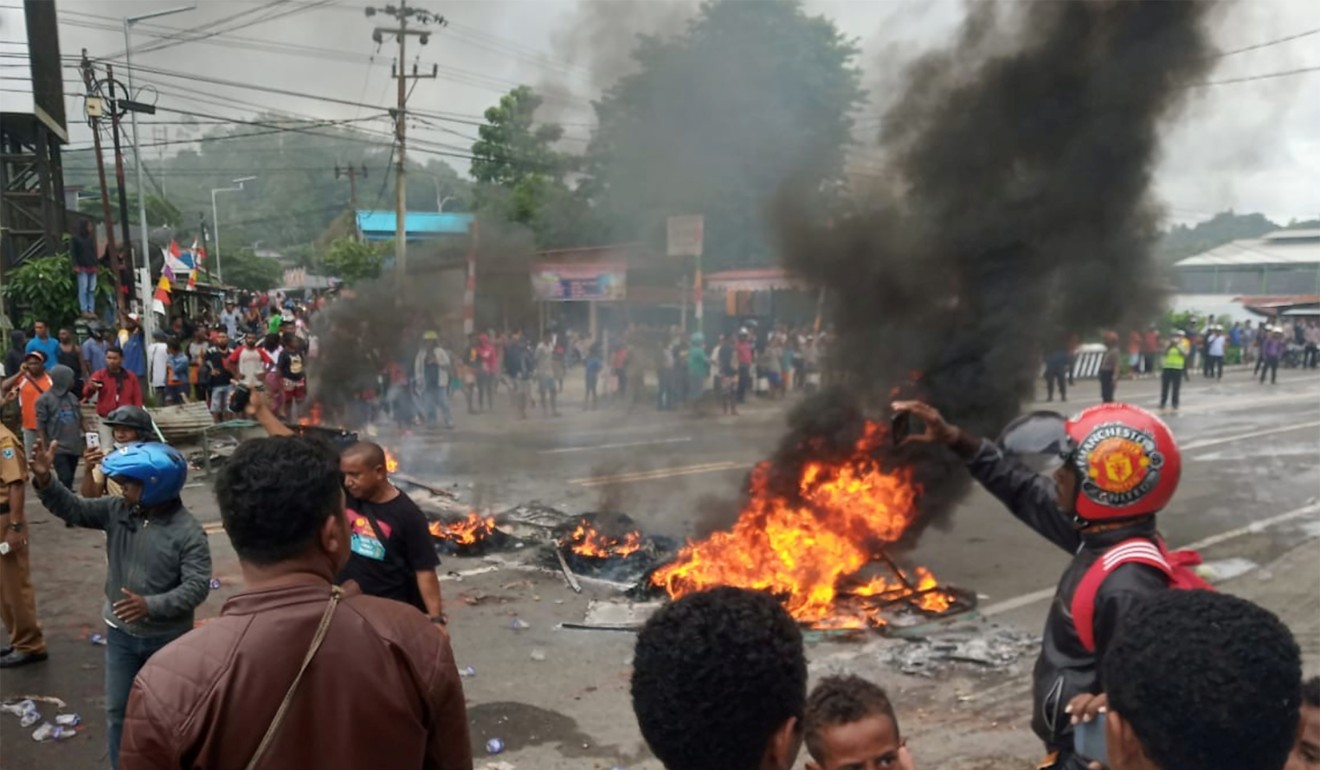 People burn tyres during a protest in Manokwari, West Papua, Indonesia. Photo: Reuters
