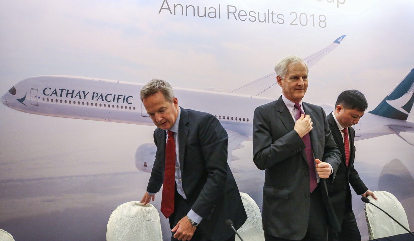 Rupert Hogg (left), Cathay Pacific chairman John Slosar and Paul Loo. Photo: Xiaomei Chen