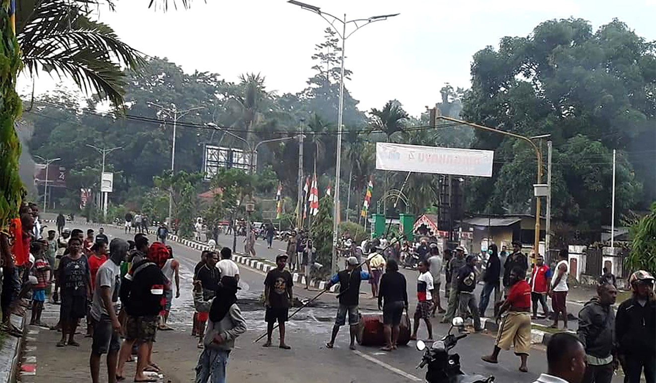 Protesters face off with Indonesian police. Photo: AFP