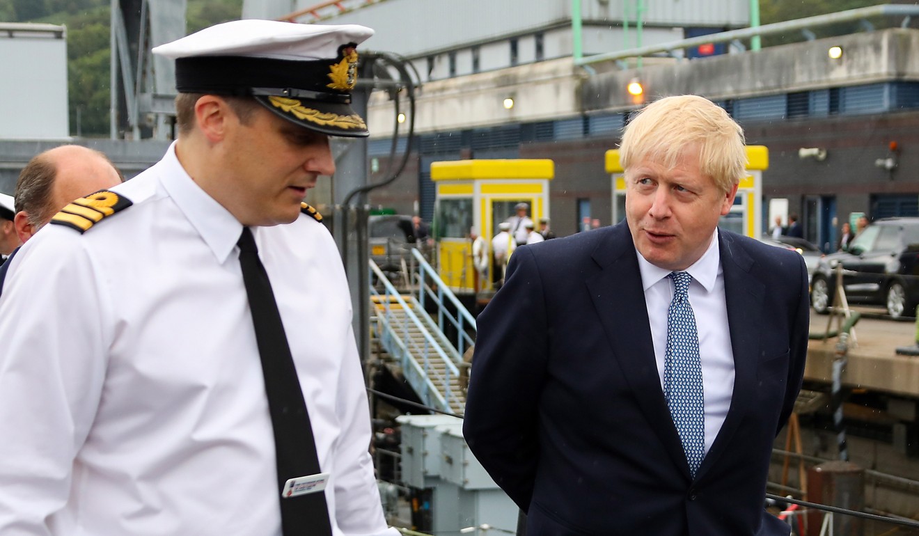 British Prime Minister Boris Johnson visits a naval base in Faslane, Scotland, that is home to the UK’s nuclear weapons. Photo: EPA