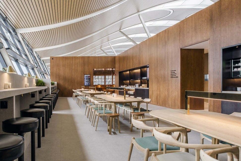 Wood panelling helps to create a warm atmosphere in the dining area in Cathay Pacific’s business lounge at Shanghai Pudong International Airport. Photo: Cathay Pacific