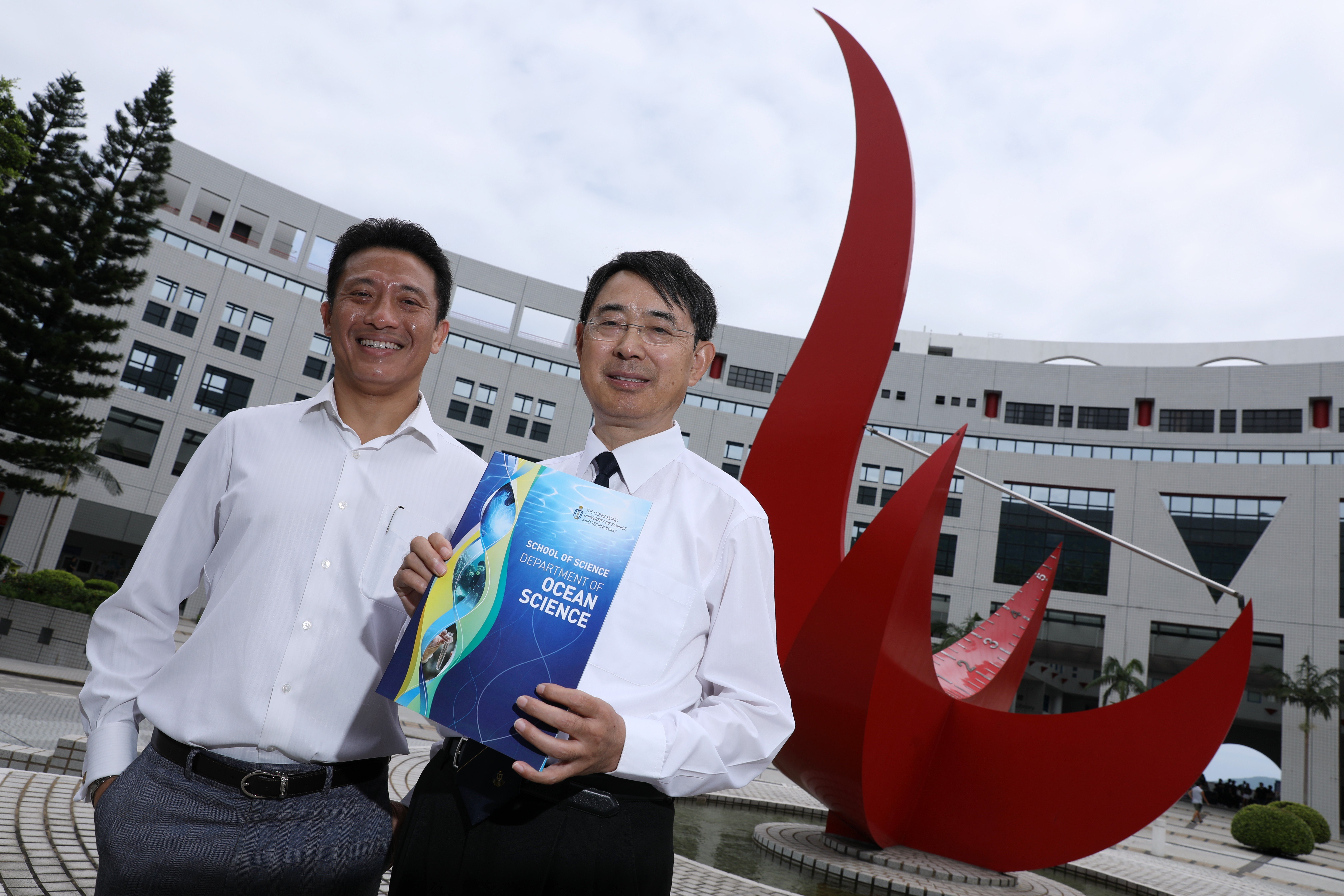 Patrick Yue (left) Qian Peiyuan (right), who are among the first beneficiaries of cross-border grants for scientific collaboration within the Greater Bay Area. Photo: Nora Tam