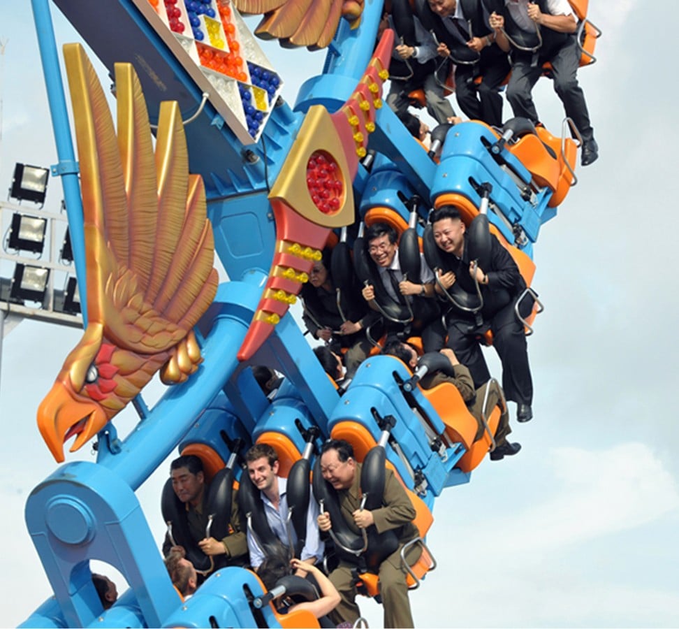 British diplomat Barnaby Jones joins Kim on roller coaster at the opening of the Rungna People’s Pleasure Ground in Pyongyang, in 2012. Photo: AFP