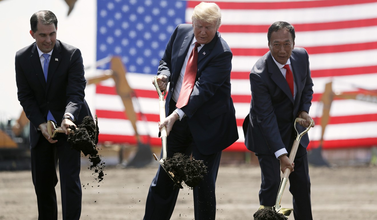 Former Wisconsin governor Scott Walker (left), Donald Trump and Foxconn founder Terry Gou take part in a groundbreaking ceremony for a new facility in Mount Pleasant. Photo: AP