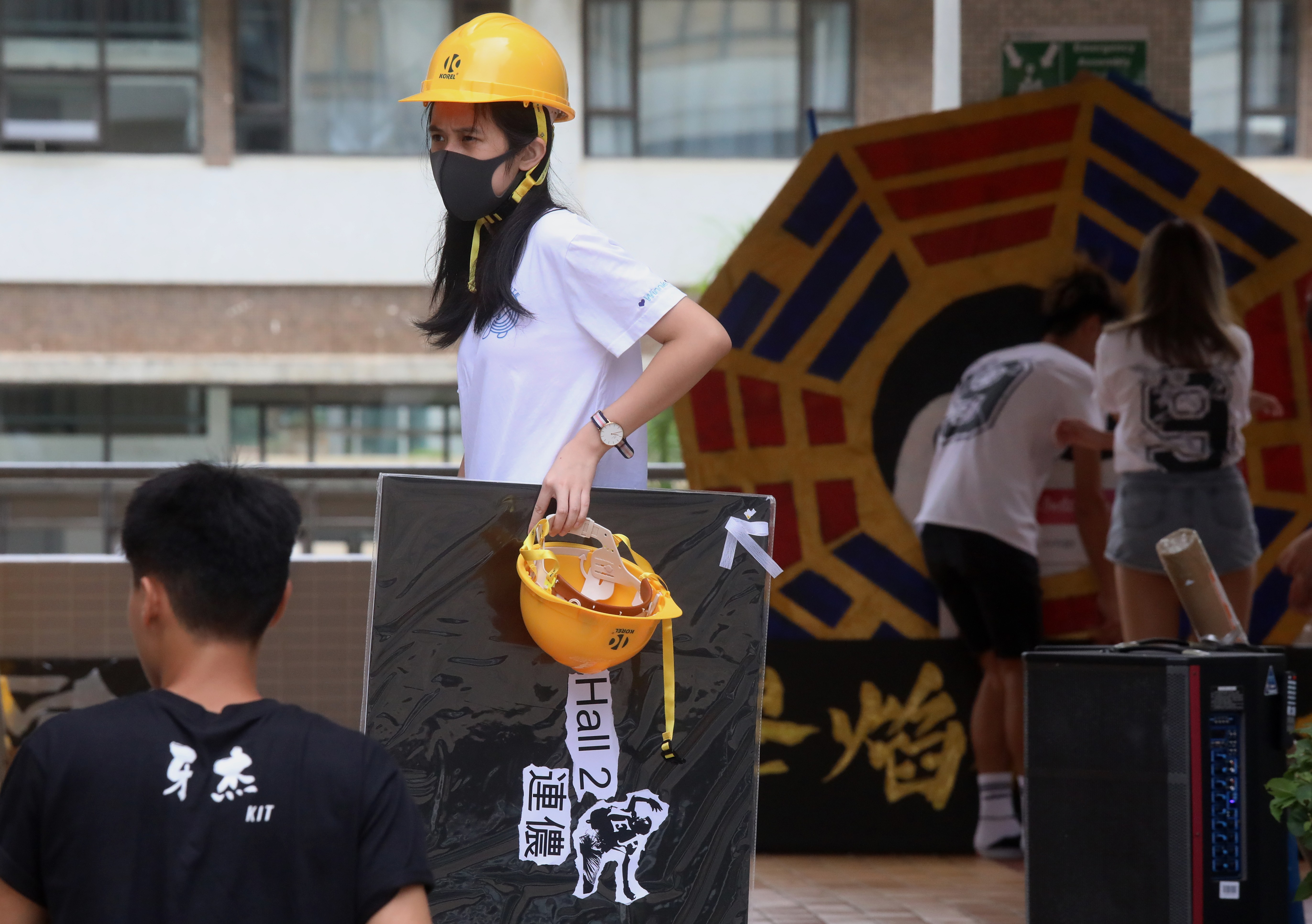 Some students dressed in full protest gear on orientation day at Hang Seng University, Sha Tin on Tuesday. Photo: K.Y. Cheng