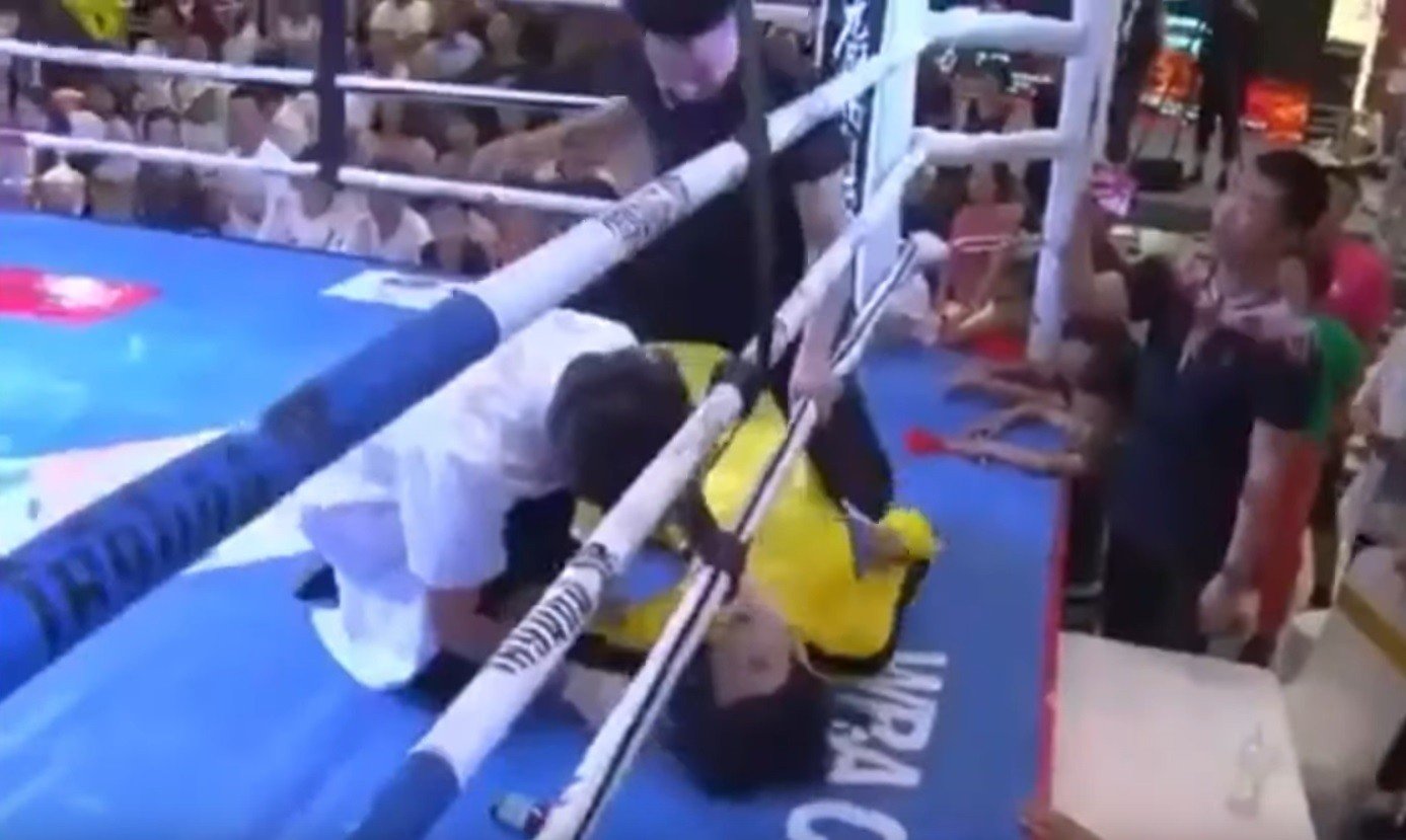 Tan Long lies flat on the canvas after being knocked out by Xuan Wu. Photos: YouTube/Fight Commentary Breakdowns