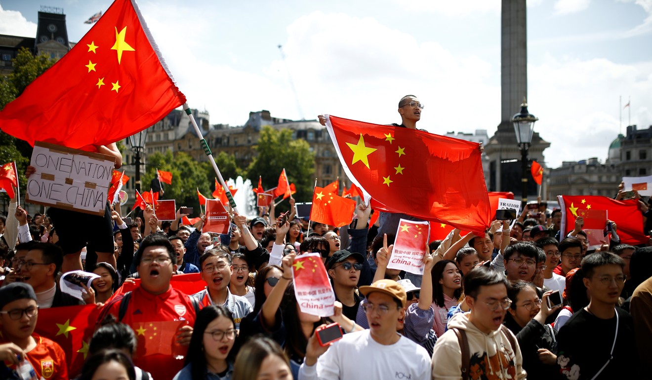 Pro-China demonstrators face off against Hong Kong protesters in central London on August 17. Photo: Reuters