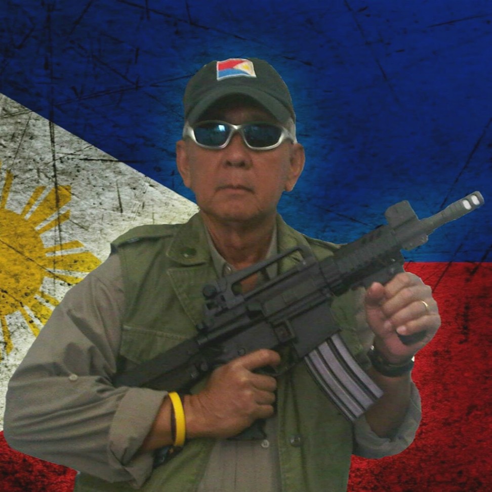 Perfecto Yasay in 2016 shared a controversial picture of himself holding a rifle in support of Duterte's drug war. Photo: Facebook