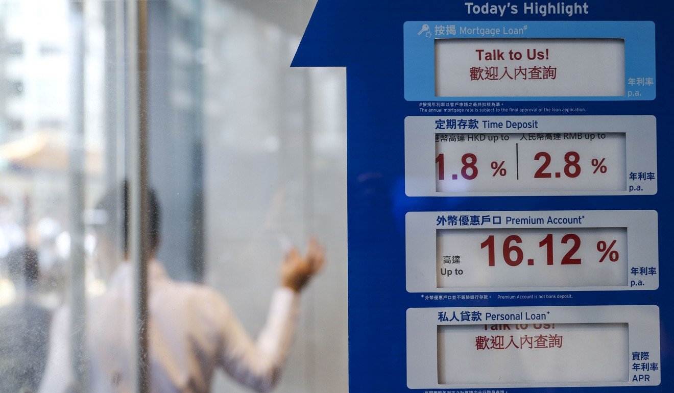 If capital flows out of Hong Kong, Hong Kong-dollar liquidity dries up, and local interest rates rise until they reach a level that attracts capital back again. Photo: Winson Wong
