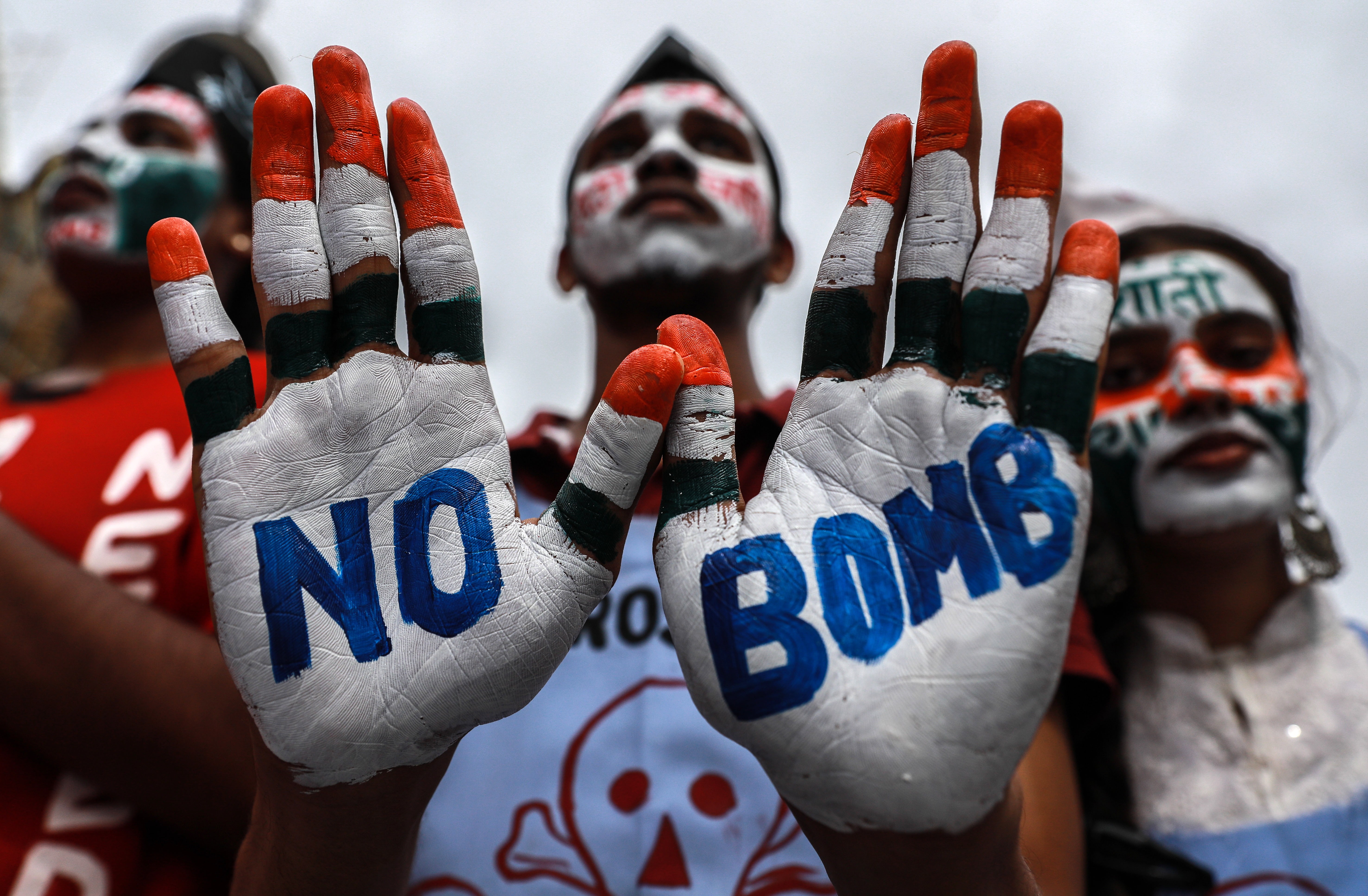 An Indian student with peace messages written on his hands takes part in a “Hiroshima Day” peace rally in Mumbai. Photo: EPA-EFE
