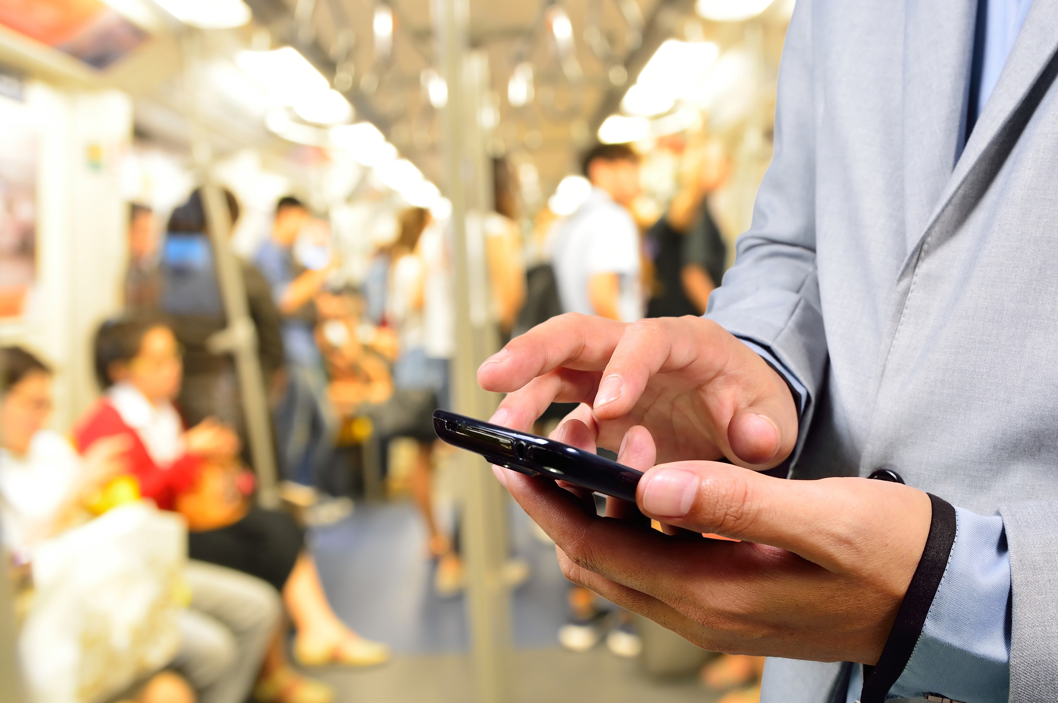 Cities across China are listening to the complaints of commuters and ordering owners of noisy mobile phones and music devices to turn them down and wear earphones. Photo: Shutterstock