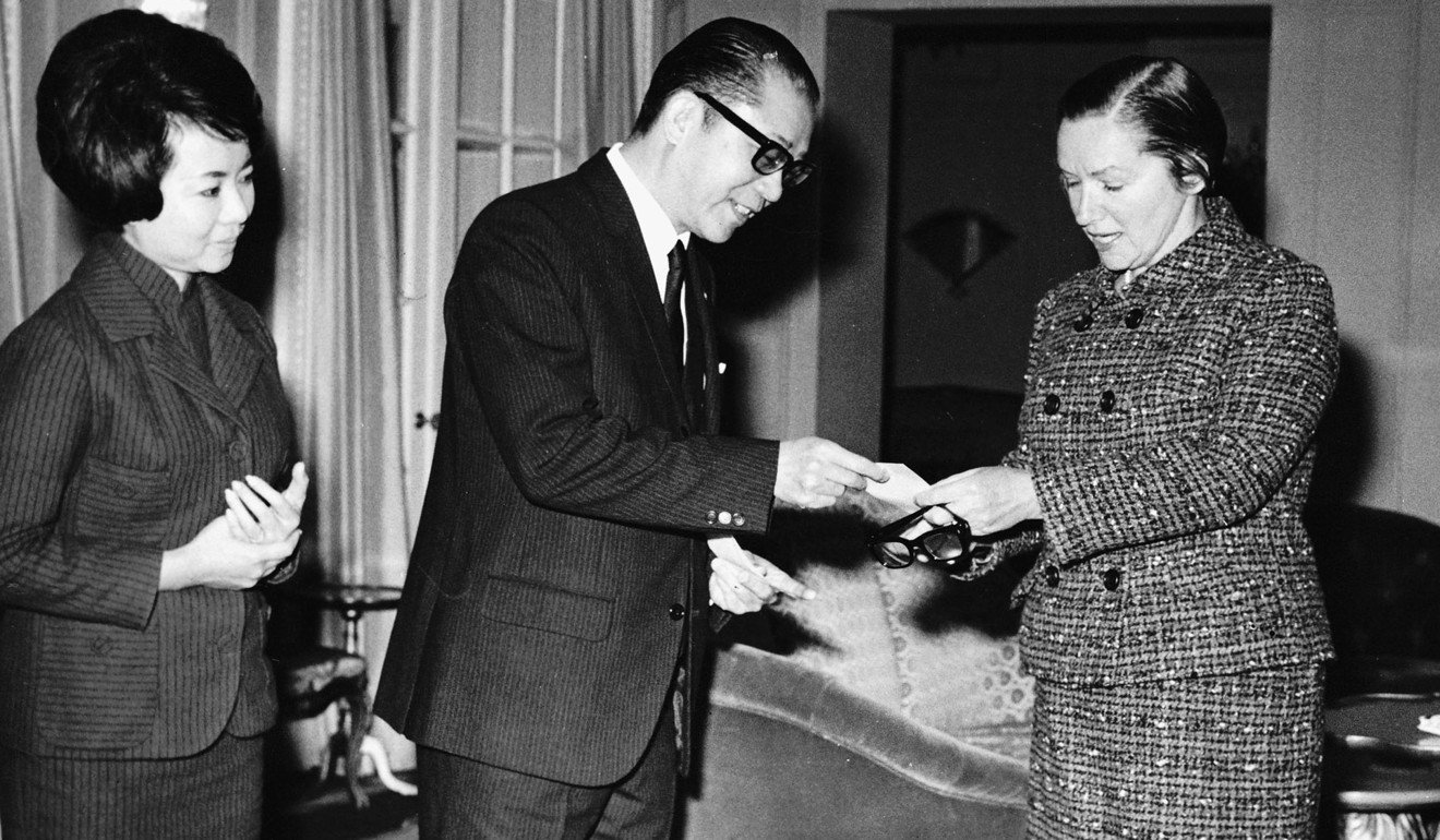 Chan Shun (centre), founder of Crocodile Garments Limited, presents a HK$1 million cheque to Lady Margaret Trench, wife of Hong Kong governor Sir David Trench, for the building of the Hong Kong Adventist Hospital in 1969. Photo: SCMP Pictures