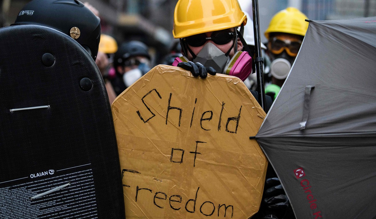 Protesters in Kowloon Bay on August 24 as a standoff in a working-class district descended into violence. Photo: AFP