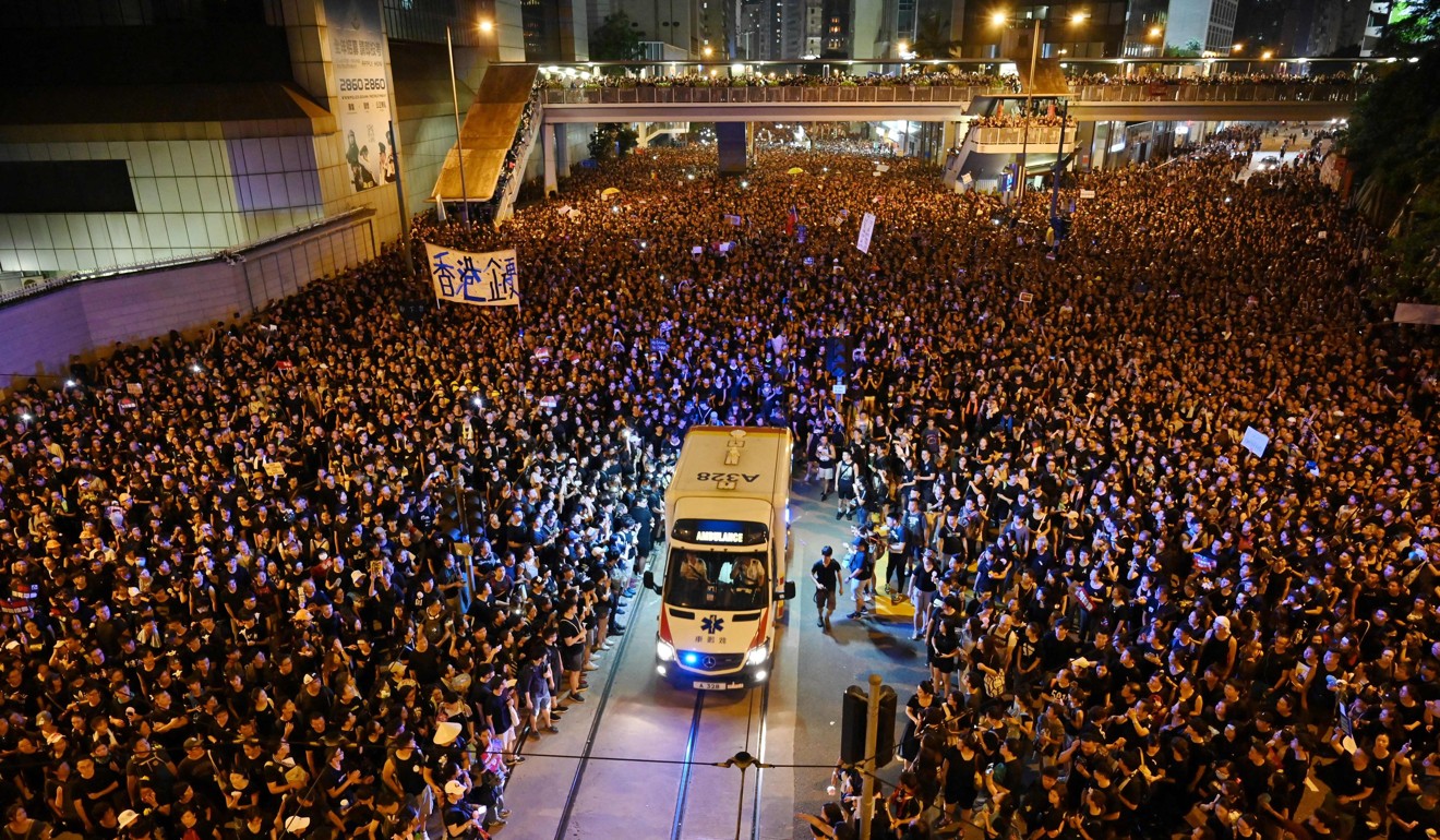 Protesters make way for an ambulance during a rally against the now-shelved extradition bill, in Hong Kong on June 16. The scene evoked a groundswell of goodwill, even among mainland Chinese. But violence and vandalism in later days changed that. Photo: AFP