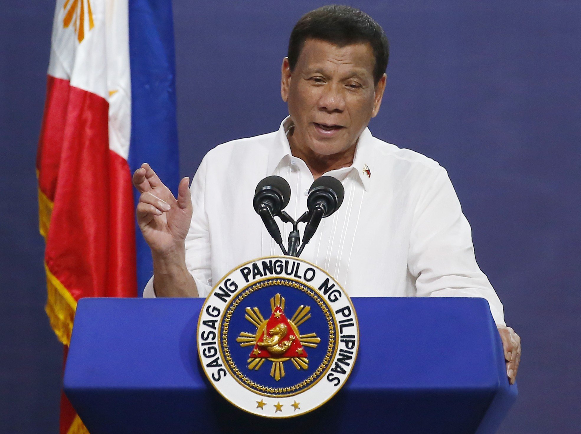 Philippine President Rodrigo Duterte addresses a land reform event in Manila on August 27. Photo: AP