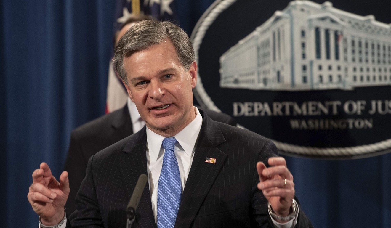 FBI Director Christopher Wray says the bureau has nearly 1,000 economic espionage and intellectual property theft investigations open, nearly all leading back to China. Photo: AFP