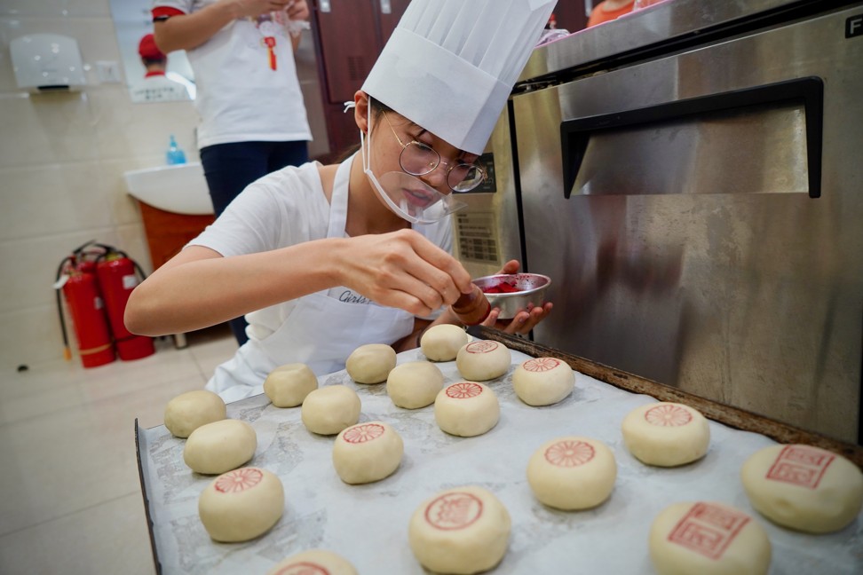Mooncakes are often stamped with the bakery’s name. Photo: Tom Wang