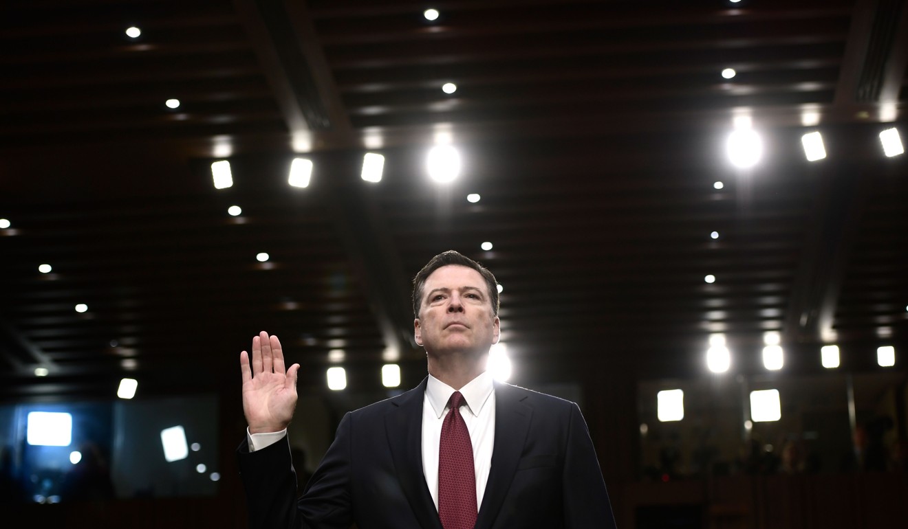 Former FBI Director James Comey takes the oath before he testifies during a US Senate Select Committee. Photo: AFP