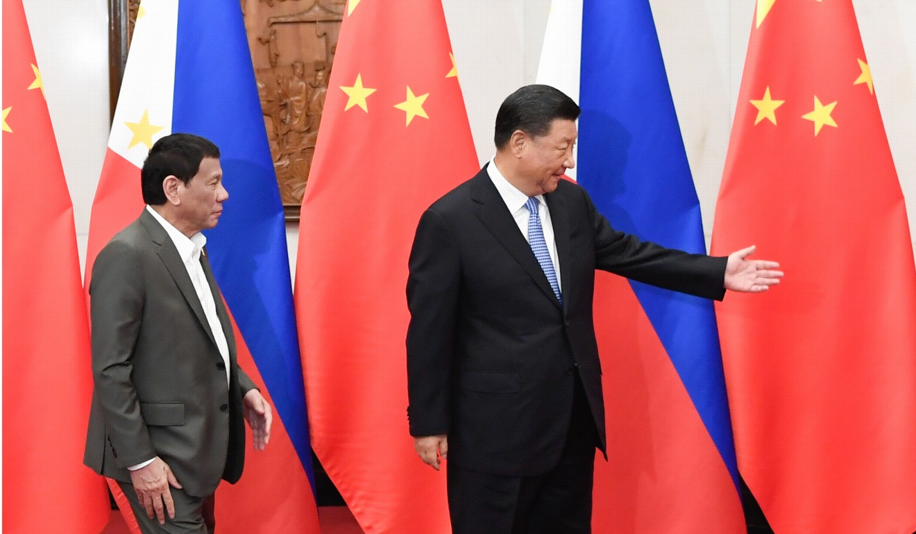 Philippine President Rodrigo Duterte (left) meets his Chinese counterpart Xi Jinping at the Diaoyutai State Guesthouse in Beijing on Thursday. Photo: Xinhua