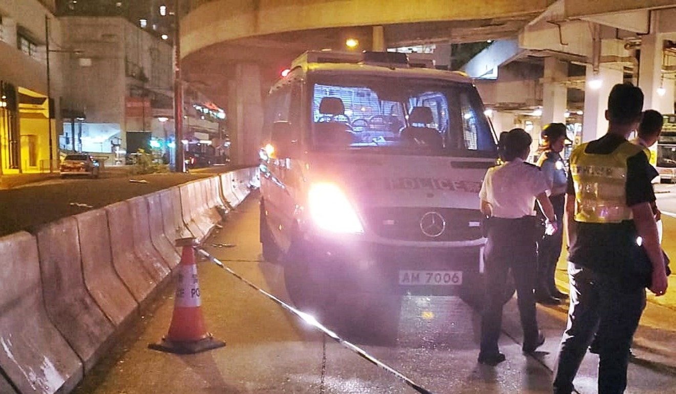 Officers investigate after an off-duty officer was stabbed in Kwai Chung. Photo: Facebook