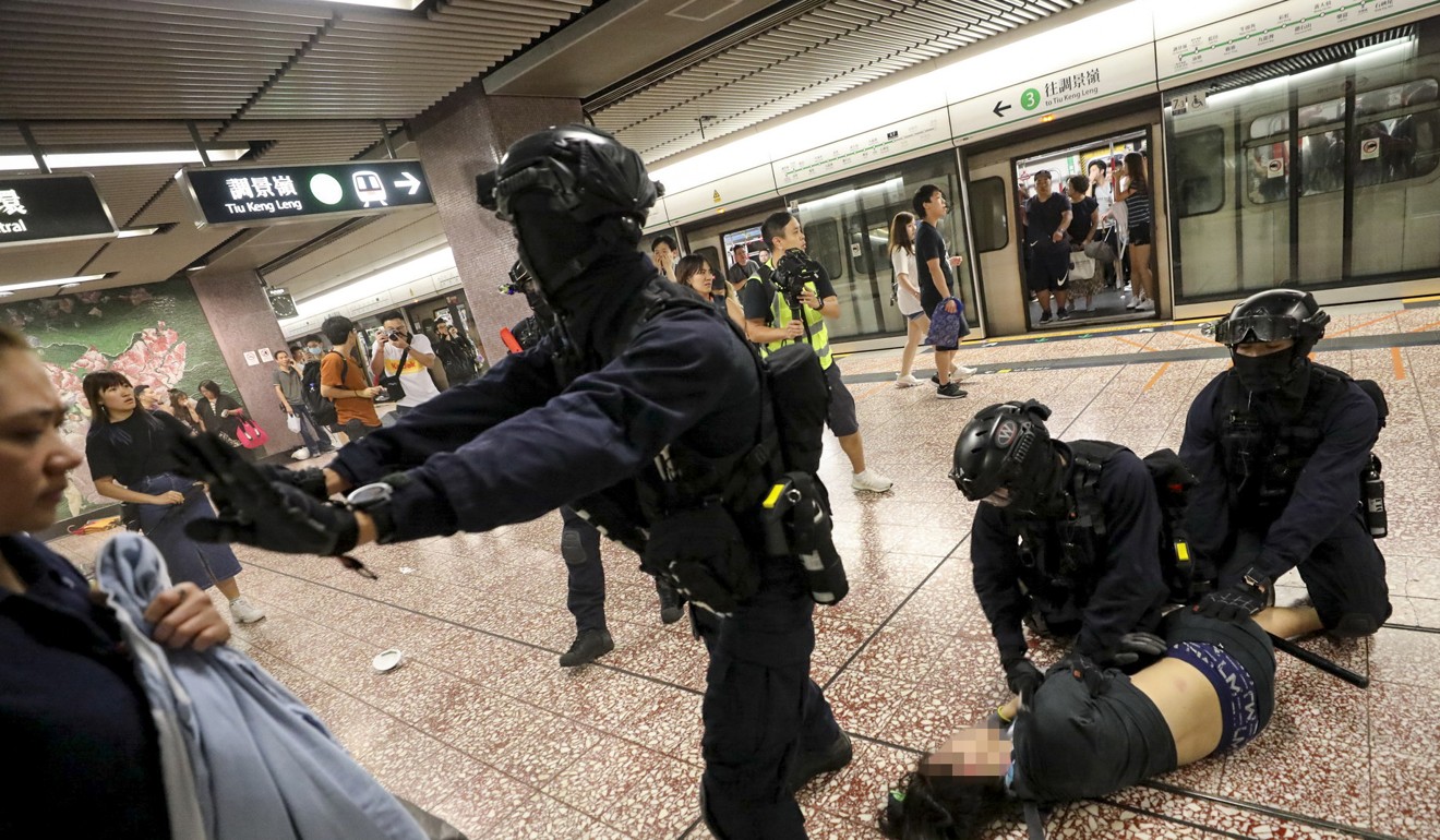 Riot police make arrests in Prince Edward station. Photo: Handout