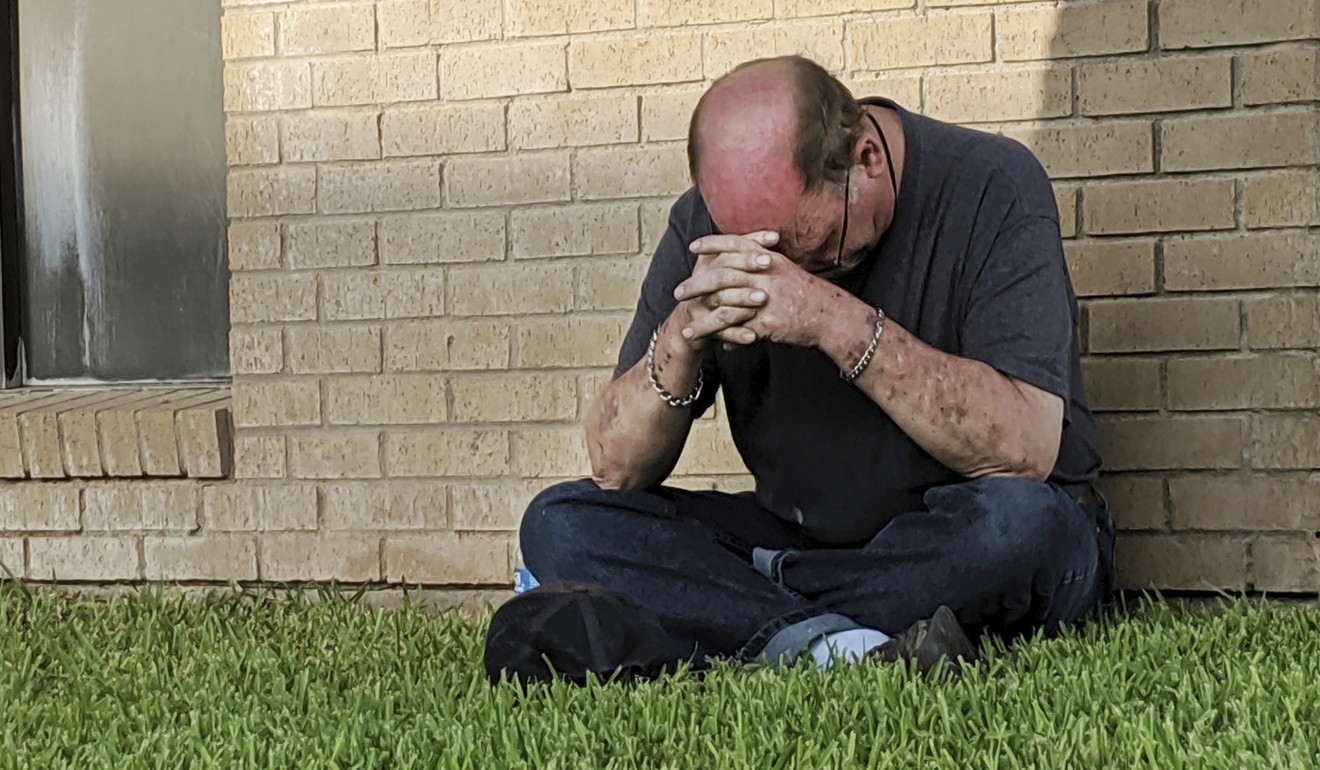 A man prays outside the Medical Center Hospital Emergency in Odessa, Texas. Photo: AP