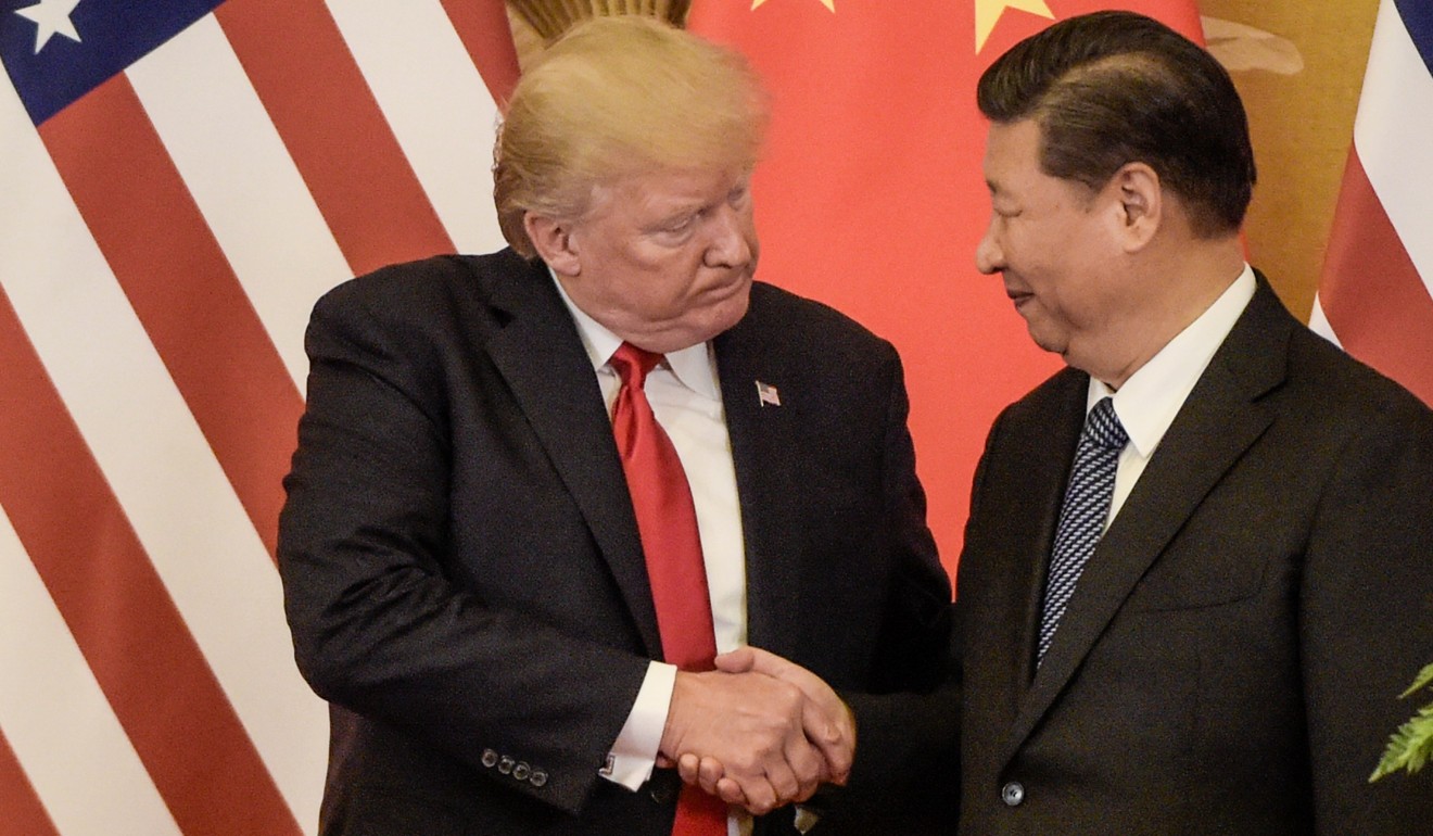 Donald Trump meets Xi Jinping in Beijing in 2017. Efforts to resolve the US-China tariff war have stalled. Photo: AFP