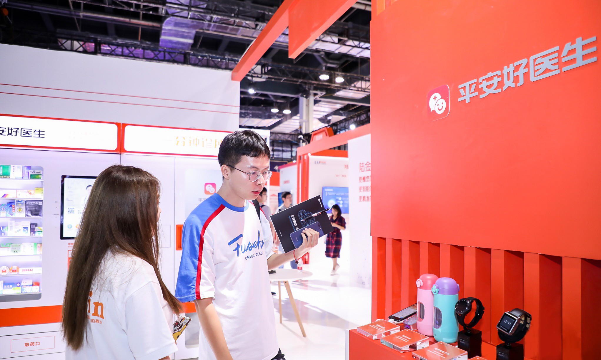 Visitors to the World Artificial Intelligence Conference in Shanghai checking out smart gadgets displayed by Ping An Good Doctor on August 29, 2019. Photo: SCMP/Handout