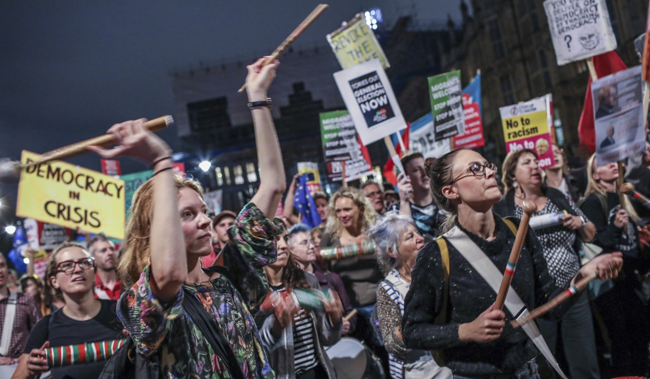 Protesters outside the House of Commons in London on Tuesday. Photo: AP