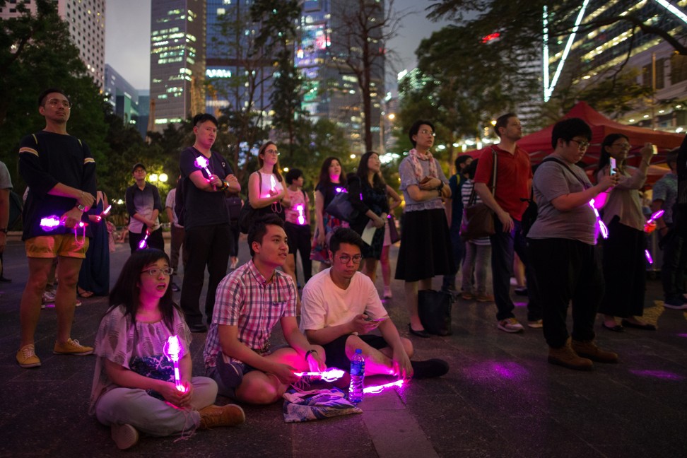 Members of the LGBT attend an evening of solidarity for International Day Against Homophobia, Transphobia and Biphobia 2019 in Hong Kong. Photo: EPA