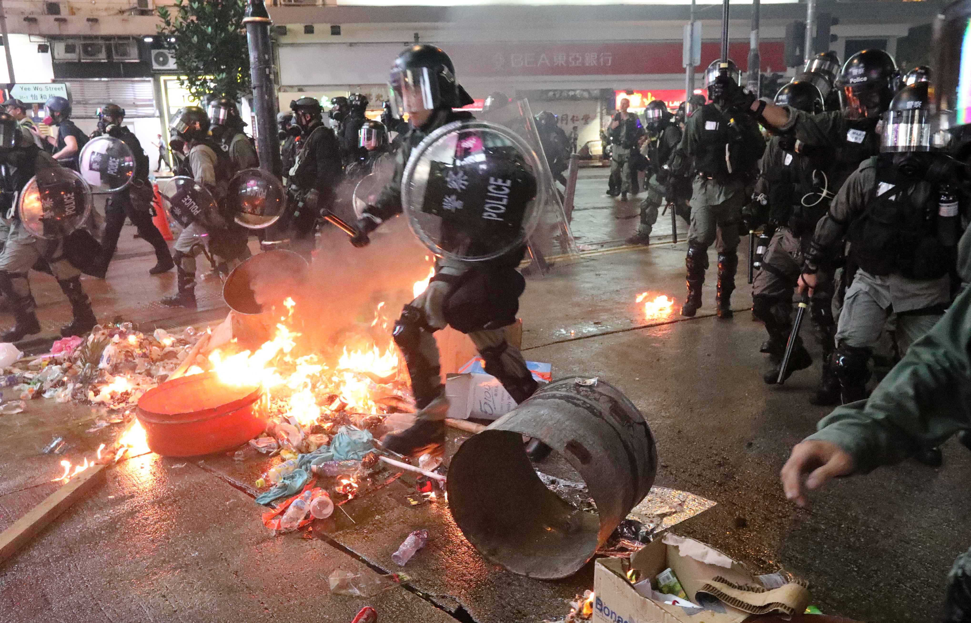 Riot police give chase as protesters throw petrol bombs in Causeway Bay on August 31. A leaked tape of Chief Executive Carrie Lam speaking to business leaders revealed a genuine desire to keep “one country, two systems” going in Hong Kong. Photo: Felix Wong