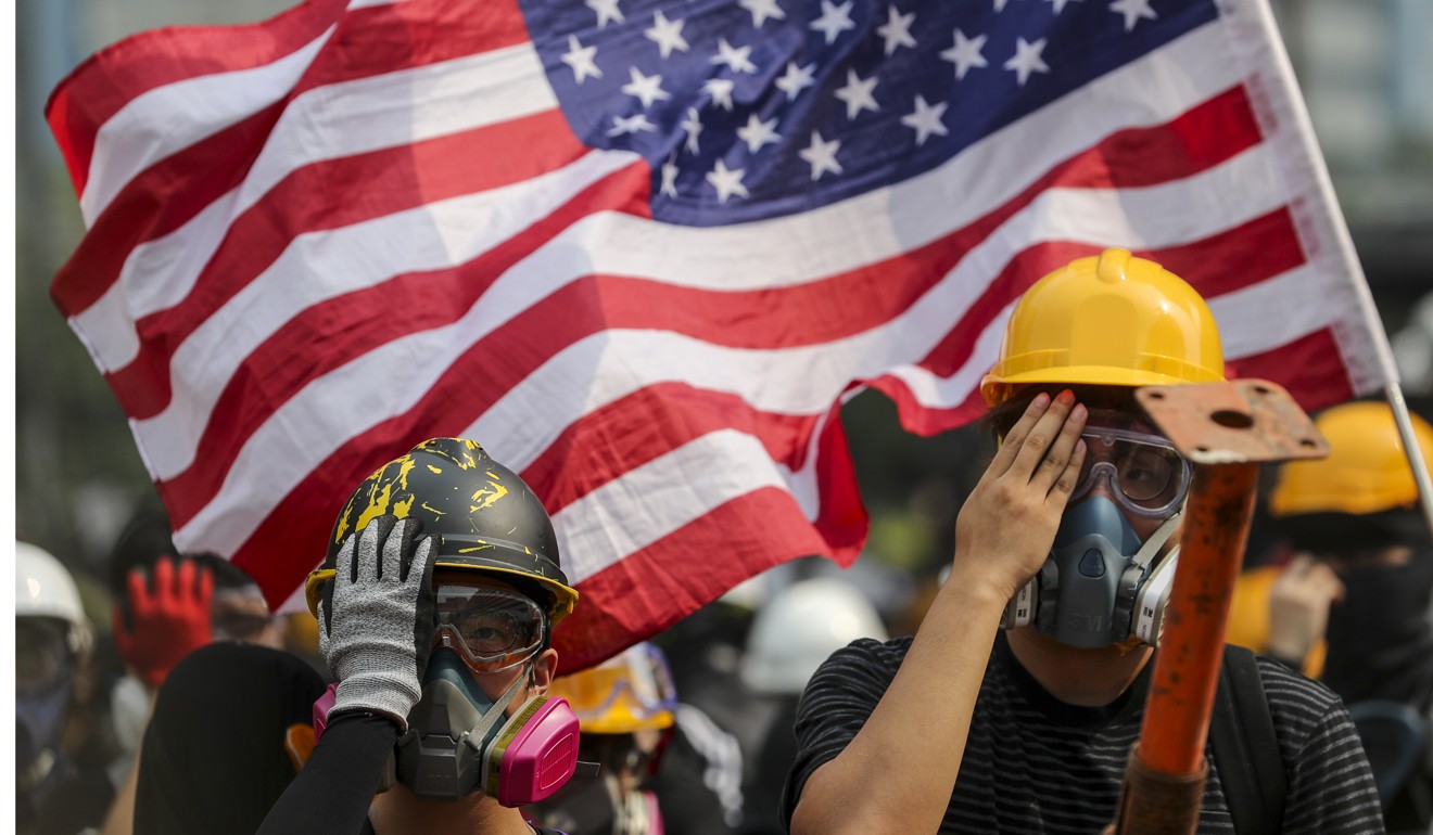 The US flag flies at an anti-government protest in Hong Kong. Photo: Sam Tsang