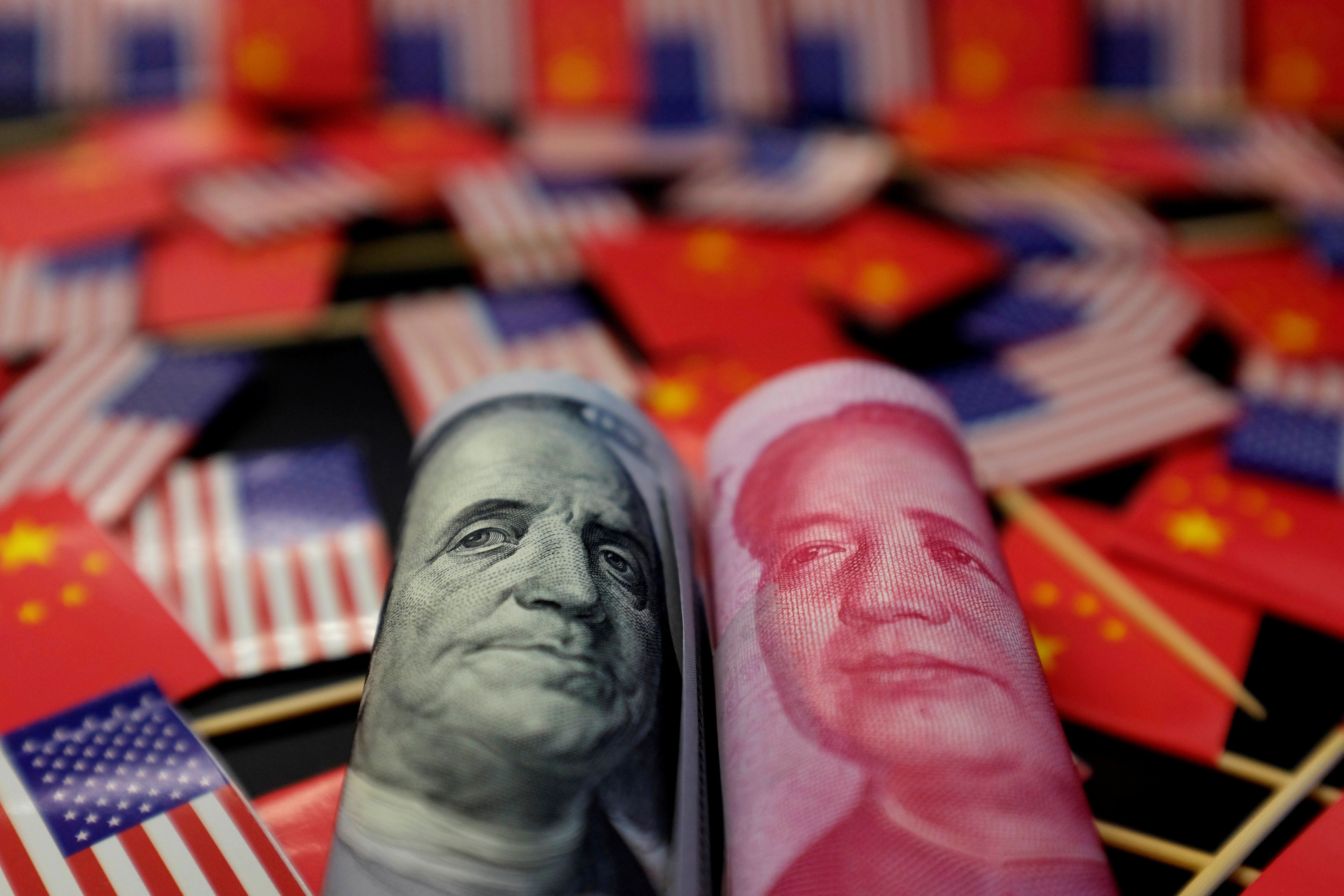 The Chinese monetary authorities let the yuan slide past the key level of 7 per US dollar in August. Photo: Reuters