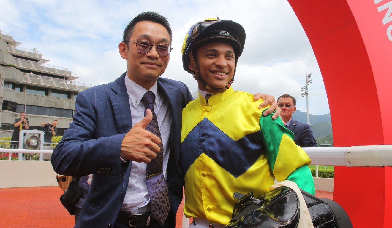 Jockey Grant van Niekerk and trainer Jimmy Ting celebrate their maiden Hong Kong victories.