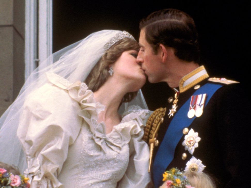 Princess Diana and Prince Charles’ first public kiss after their marriage, on the balcony of Buckingham Palace in London on July 29, 1981