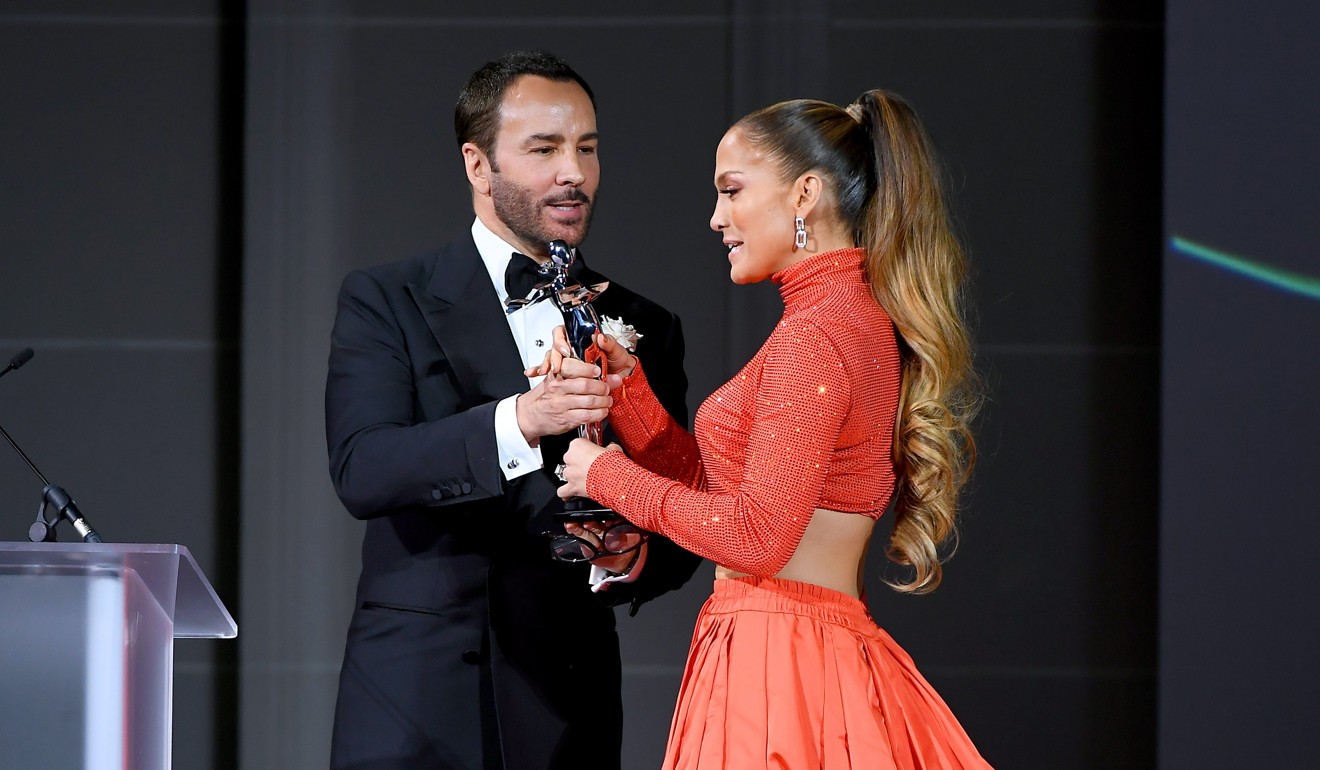 Jennifer Lopez and Tom Ford appear at the CFDA Fashion Awards at the Brooklyn Museum of Art in New York. Photo: Nicholas Hunt/Getty Images/AFP