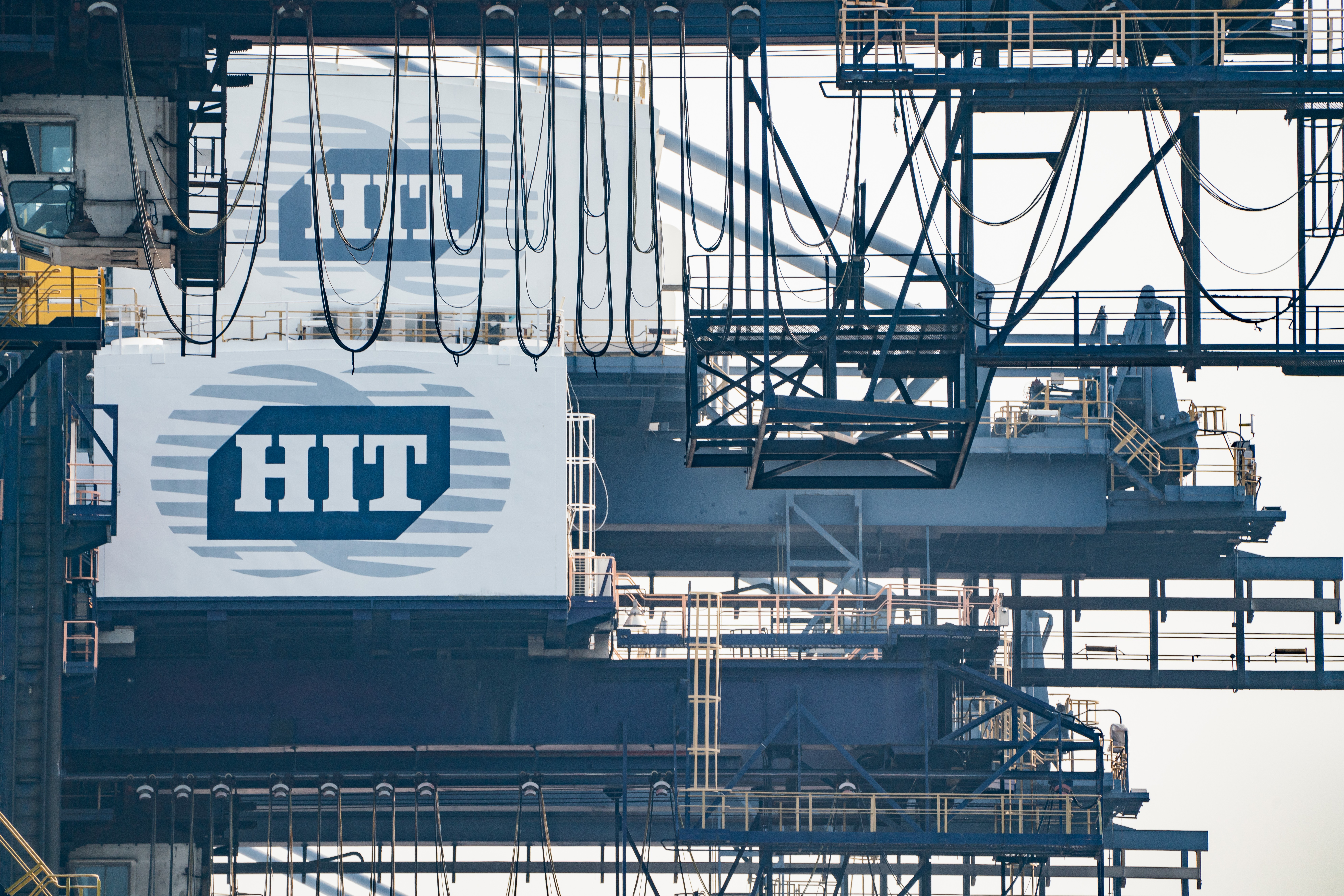 Signage for Hong Kong International Terminal (HIT), a unit of CK Hutchison Holdings, on gantry cranes at Container Terminal 9 at Kwai Tsing Container Terminal in Hong Kong on Tuesday, January 22, 2019. Photo: Bloomberg