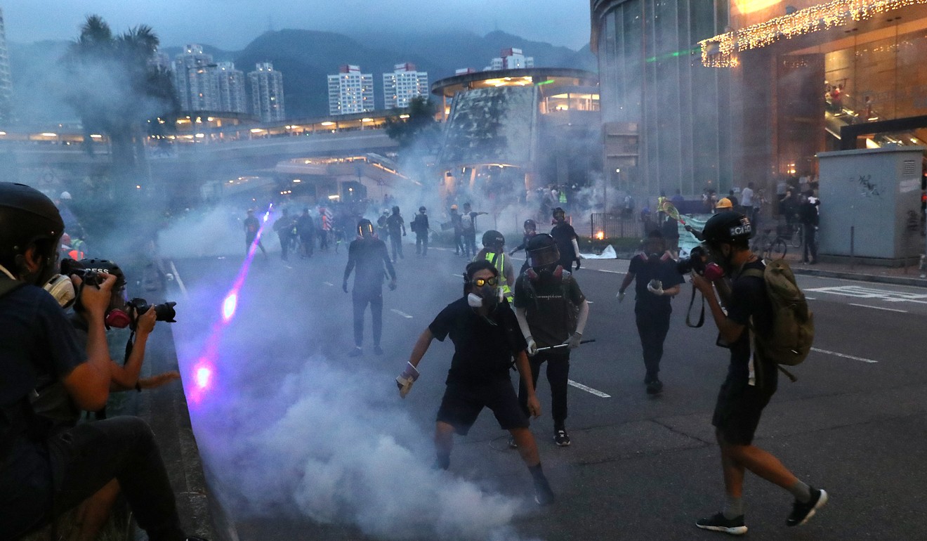 Riot police fire tear gas to disperse protesters in Tai Wai. Photo: Sam Tsang