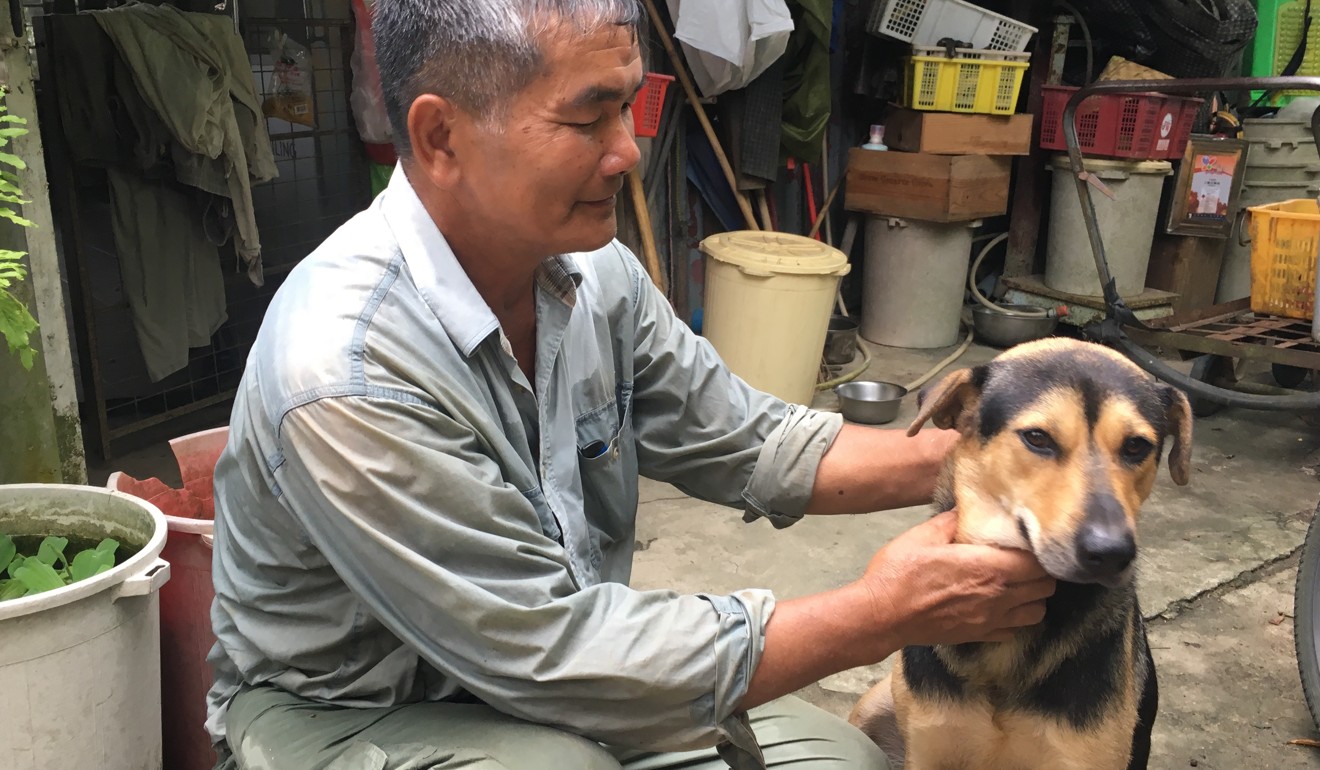 Villager Au Lau-kun, Becky’s father, and his dog in Ma Shi Po Village. Photo: Fiona Sun
