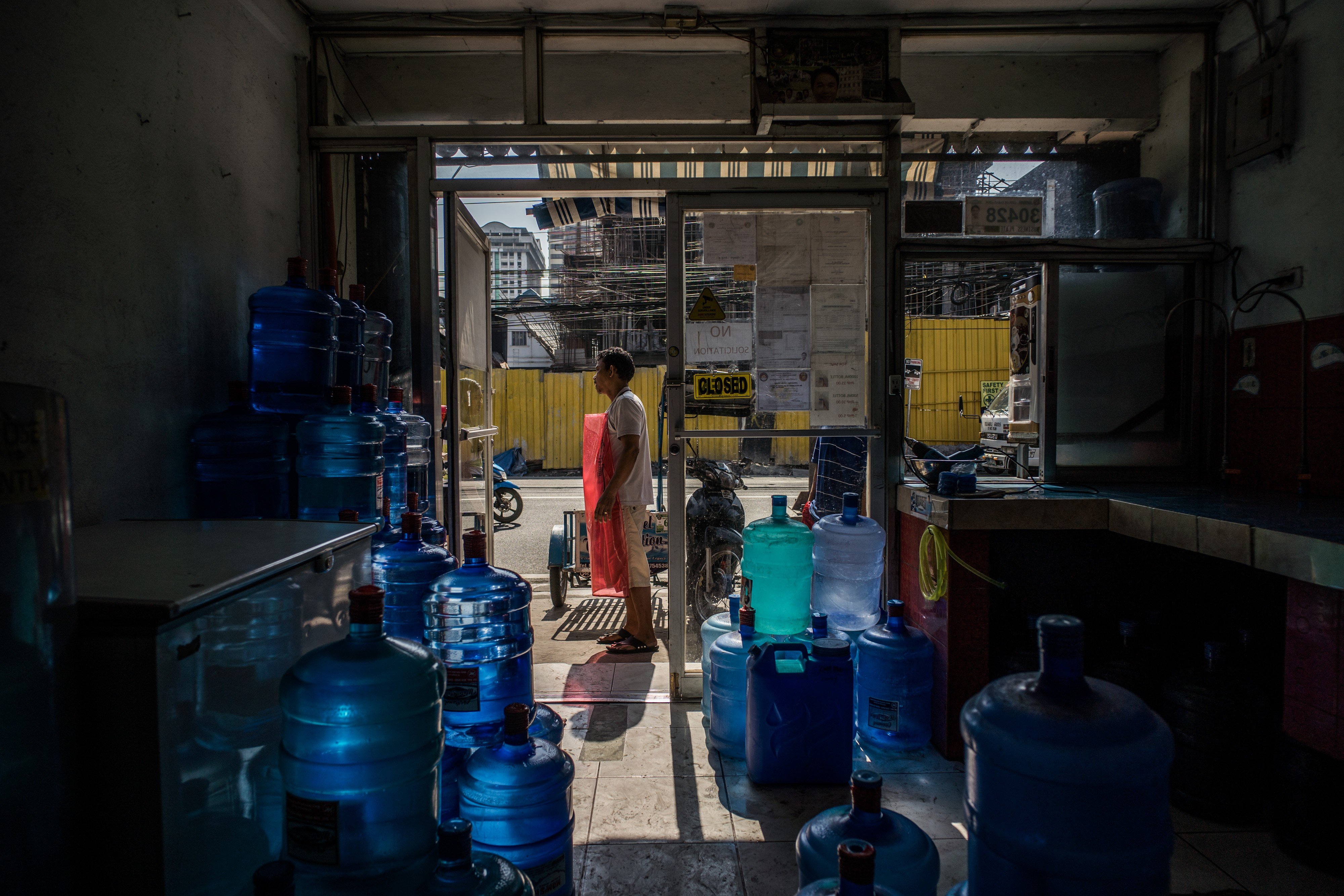 Small commercial spaces like this in Paranaque City have been faced with unreasonable rent increases since an old shopping mall named Pearl Plaza reopened to become an offshore gambling office employing thousands of Chinese workers. Photo: Martin San Diego