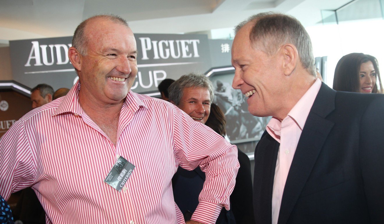 David Hayes (left) talks to John Moore attended the QE II Cup barrier draw in 2015.