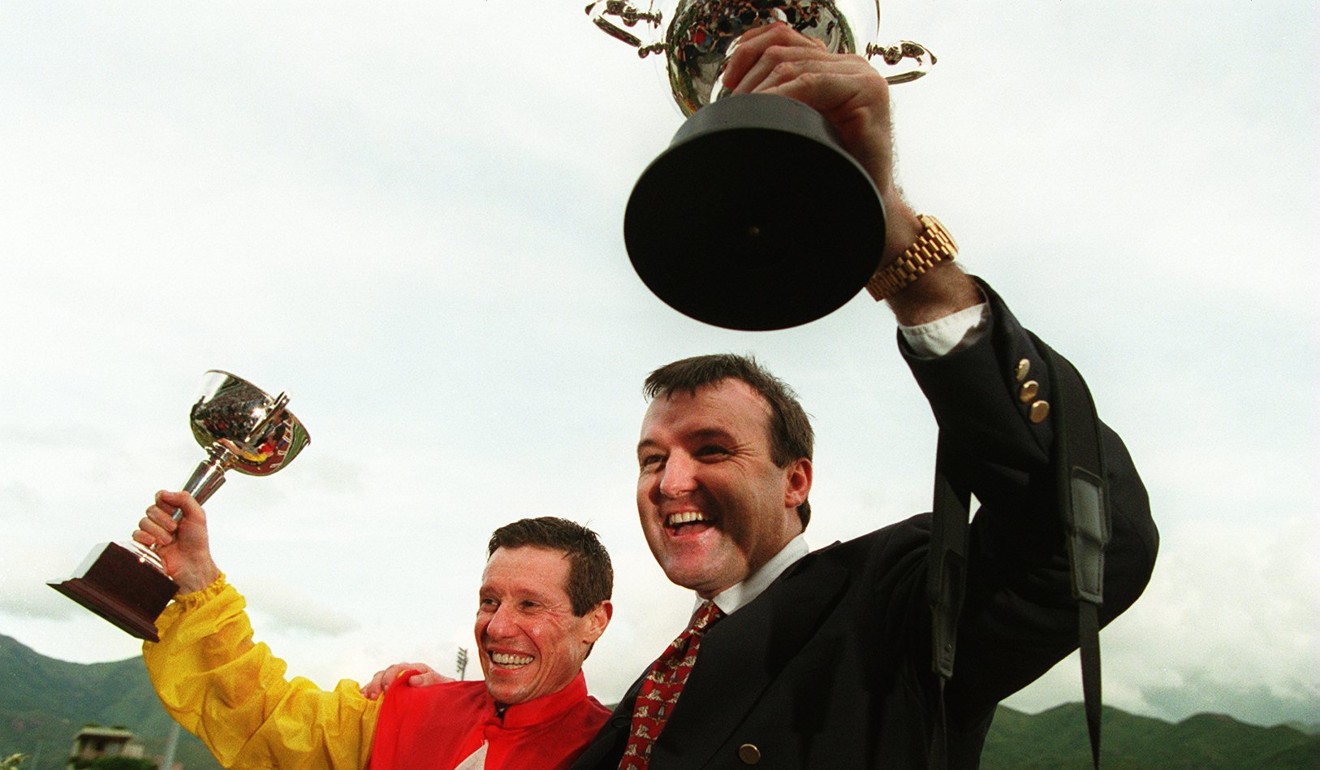 Basil Marcus and David Hayes celebrate their championships in 1998.