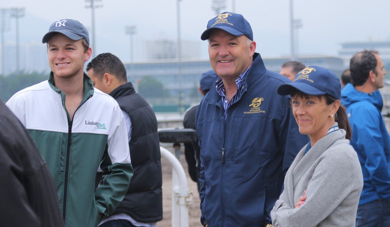 Trainer David Hayes (middle) with his son Ben and wife Prue at Sha Tin trackwork in 2015.