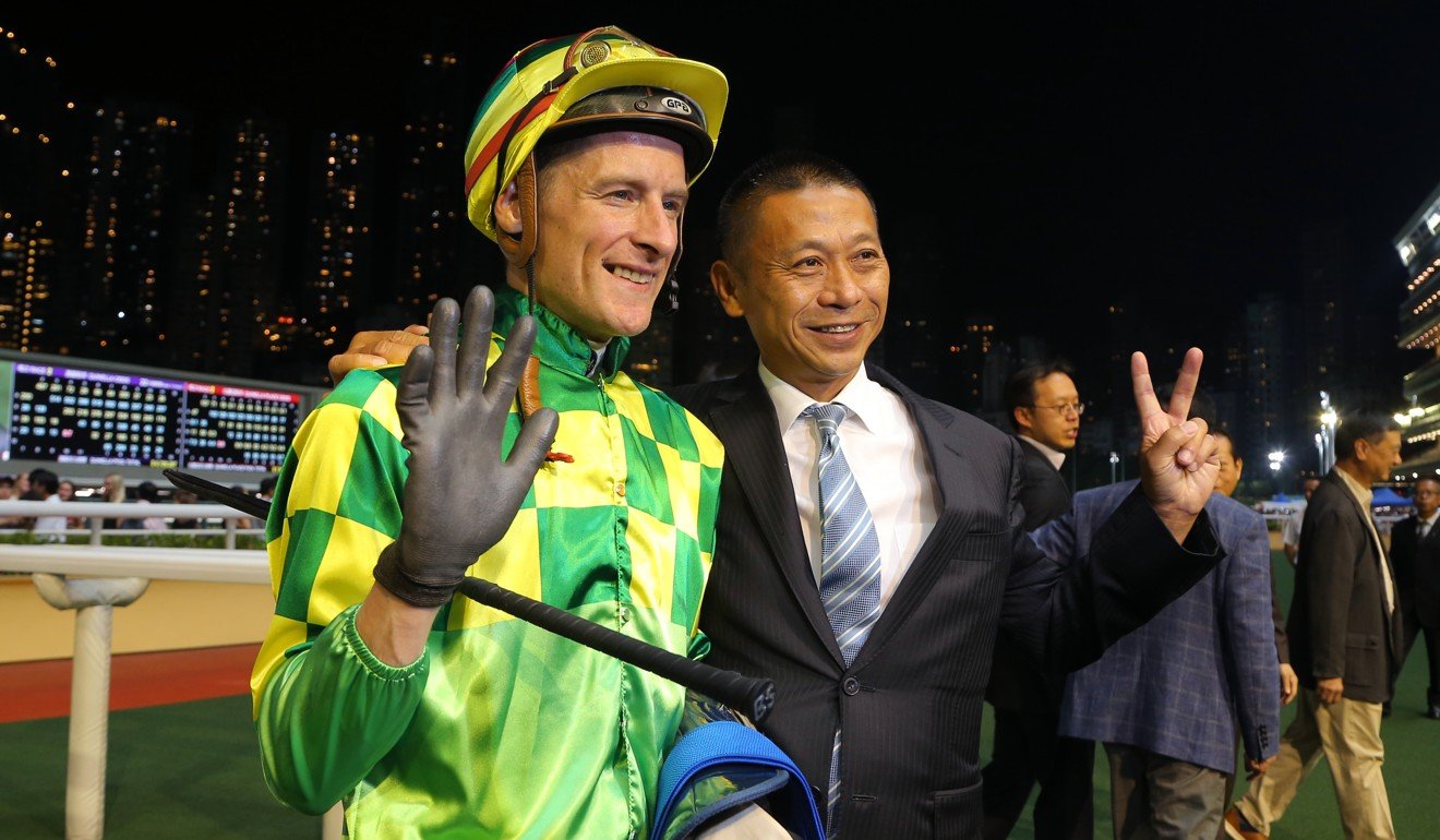 Blake Shinn and Danny Shum celebrate Green Dispatch’s win.