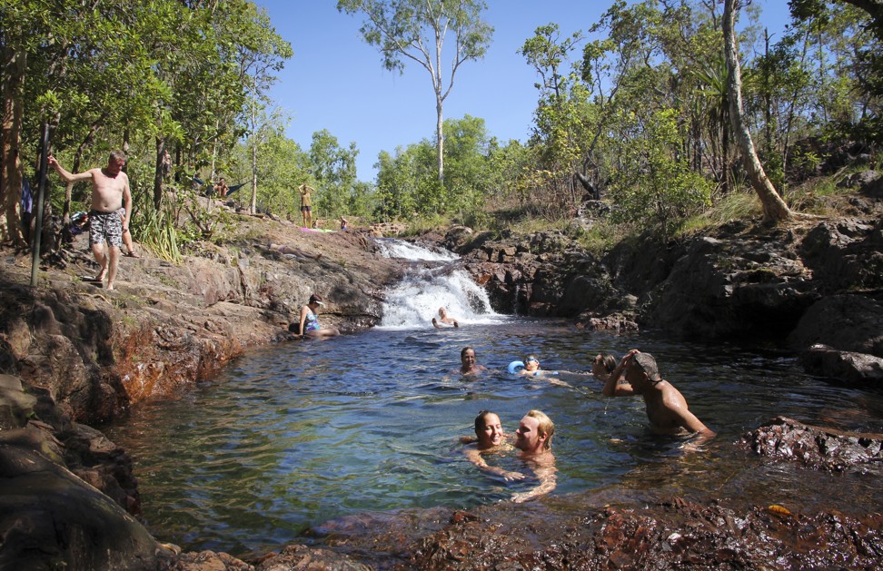 Visit the waterfalls and swim in crystal clear waters at Litchfield National Park. Photo: Alkira Reinfrank
